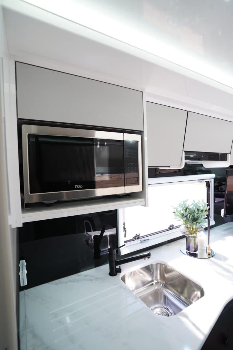 NCE 23L Flatbed Microwave: More Cooking Space, Built for the Road