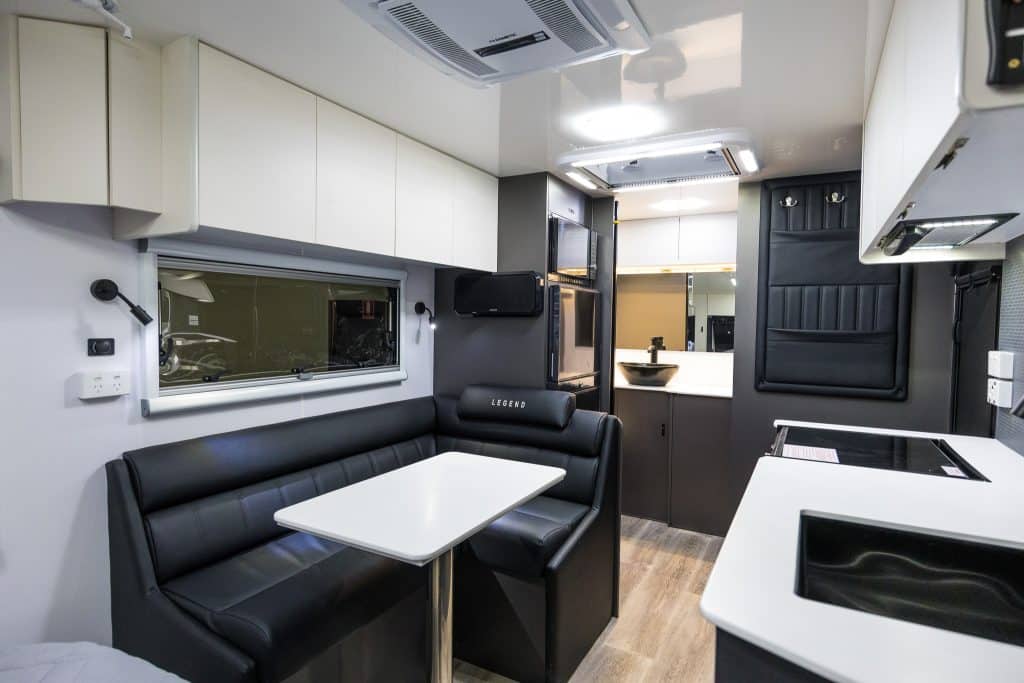 The kitchen area of the Legend Trackline hybrid caravan. Note the sunken sink